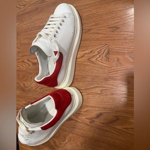 Authentic Alexander McQueens
size 9.5 in men, can fit a women's size 10